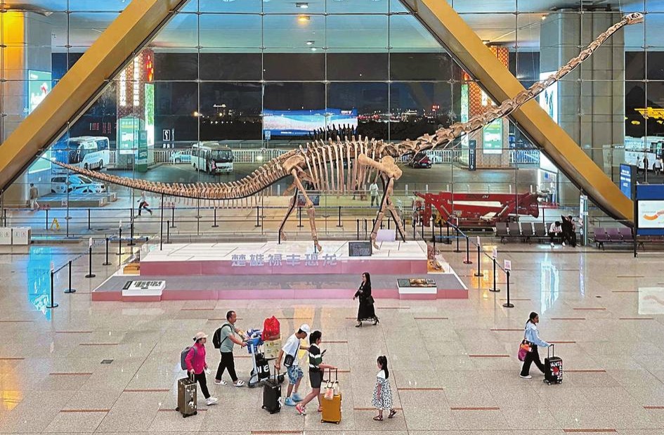 dinosaur in airport